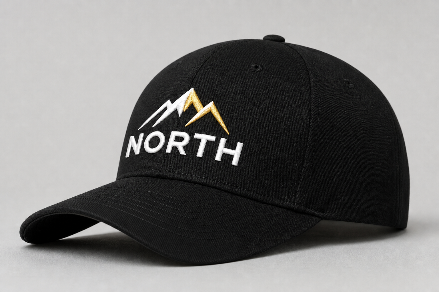 Machine-embroidered logo on the front of a baseball cap
